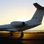 Large-cabin private jet on the ramp at golden hour
